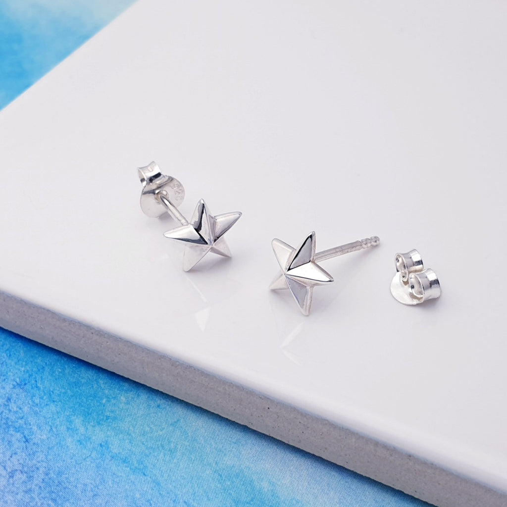 Our Silver Star Studs are an all time classic design.  Add a sparkle to your style with these cute sterling silver star studs. With a delicate design, these studs will be sure to elevate any outfit.