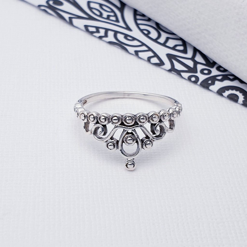 Our Sterling Silver Arabian Night Ring is perfect for everyday wear or special occasions.  A beautiful piece, this ring features an intricate cut out design enhanced by an oxidised finish and inspired by a beautiful crown, This statement piece adds an air of sophistication to any look, making it the perfect way to add a luxurious touch to any outfit.