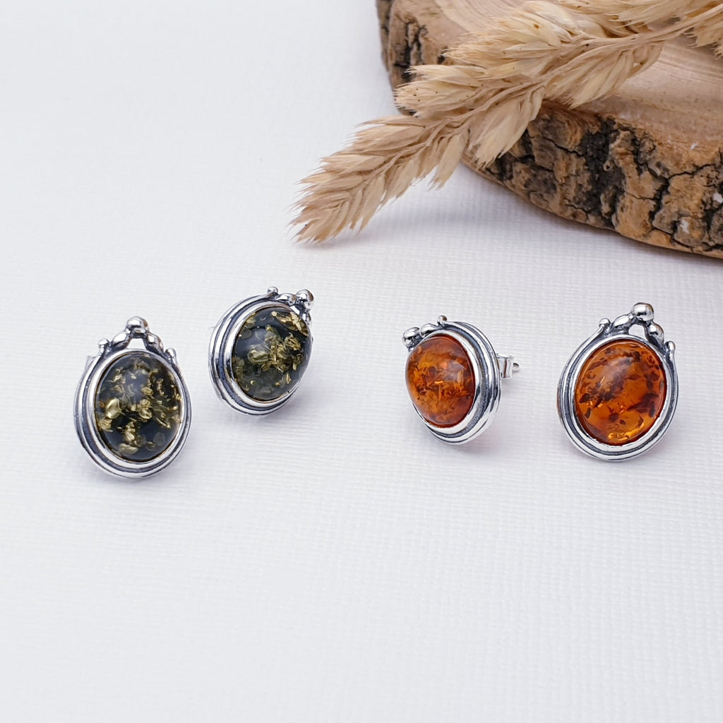 Our Toffee or Green Amber Sterling Silver Venetian Studs are perfect for everyday wear.  Add rich colour and effortless style to your look with these beautiful Amber Sterling Silver Studs. Perfectly sized and set in a classic oxidised design, these studs are sure to make a subtle yet stunning statement. 