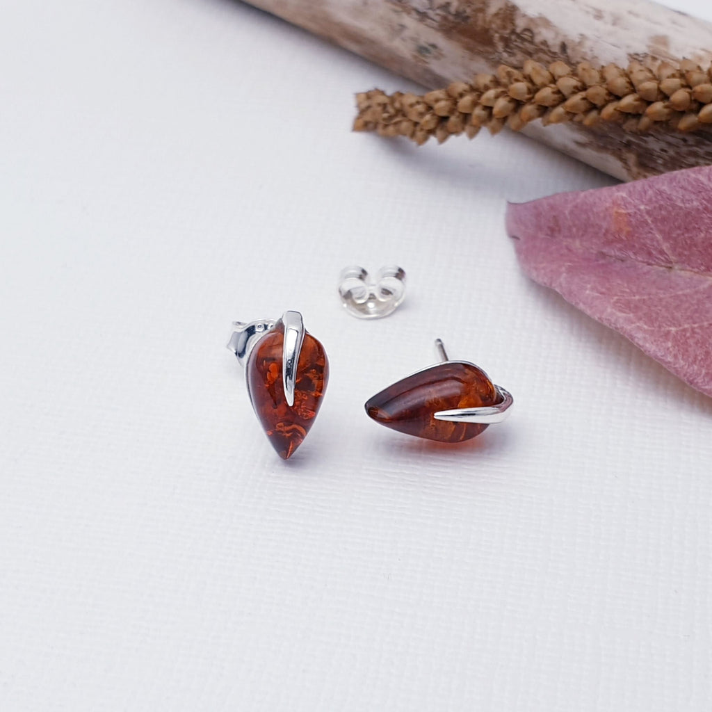 Our Toffee Amber Sterling Silver Leaf Studs are perfect for everyday wear.  Add rich colour and effortless style to your look with these beautiful marquise Amber Sterling Silver studs. Perfectly sized and set in a nature-inspired leaf design, these studs are sure to make a subtle yet stunning statement. 