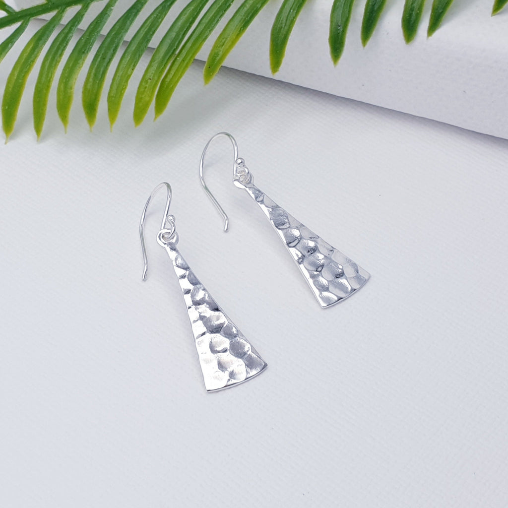 Because of their simple, contemporary design, these earrings have always been top sellers at our shops. These hammered textured Sterling Silver earrings are completely versatile, and will complement any outfit or style. Small, light on the ear and easy to wear, these will soon become everyday favourites.