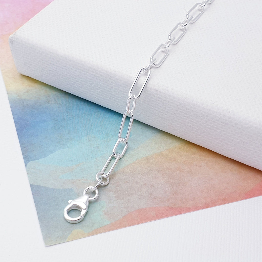 Our beautiful Sterling Silver Dual Paperclip Link Bracelet is perfect for everyday wear or special occasions.  This design features two different oval links that are connected in a paperclip pattern, creating beautiful fluidity and movement throughout the bracelet. 