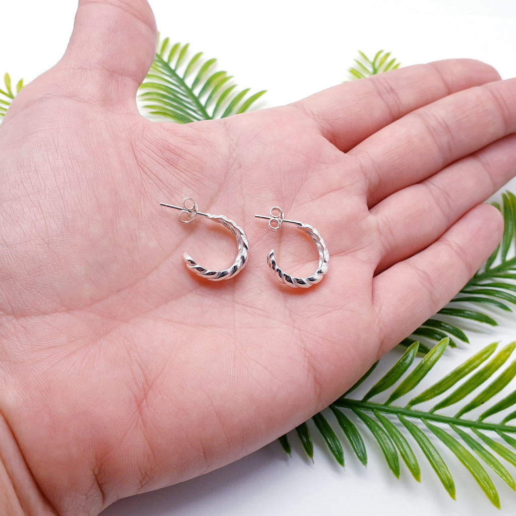 Our Sterling Silver Croissant Half Hoops are ideal for everyday wear and can transition effortlessly from work to play.  These simple croissant design half hoops have a contemporary feel, are light on the ear and easy to wear. With a stud attachment, these hoops will feel extra secure while you get on with your day and are bound to become everyday favourites.