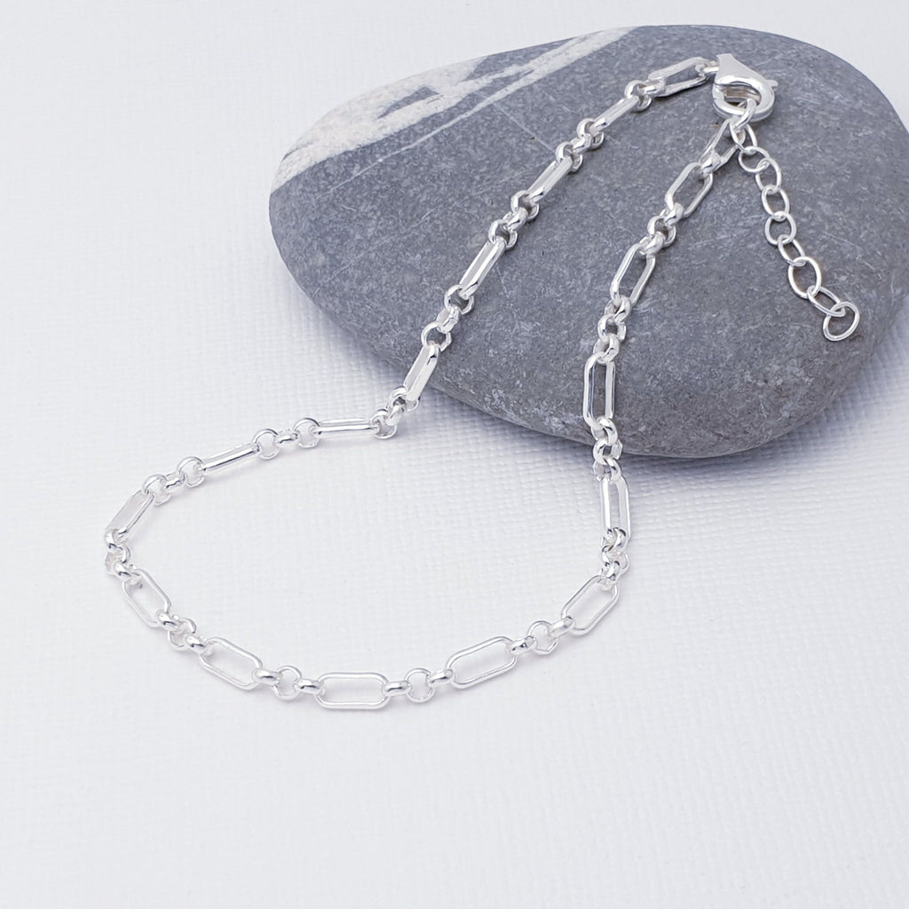 Our beautiful Sterling Silver Rectangle Circle Linked Bracelet is perfect for everyday wear or special occasions.  This design features rectangular links that are connected with smaller round links, creating a beautiful and classic design.   This bracelet has an extension chain, meaning that this bracelet can fit different wrist sizes, giving you peace of mind when buying it as a gift.
