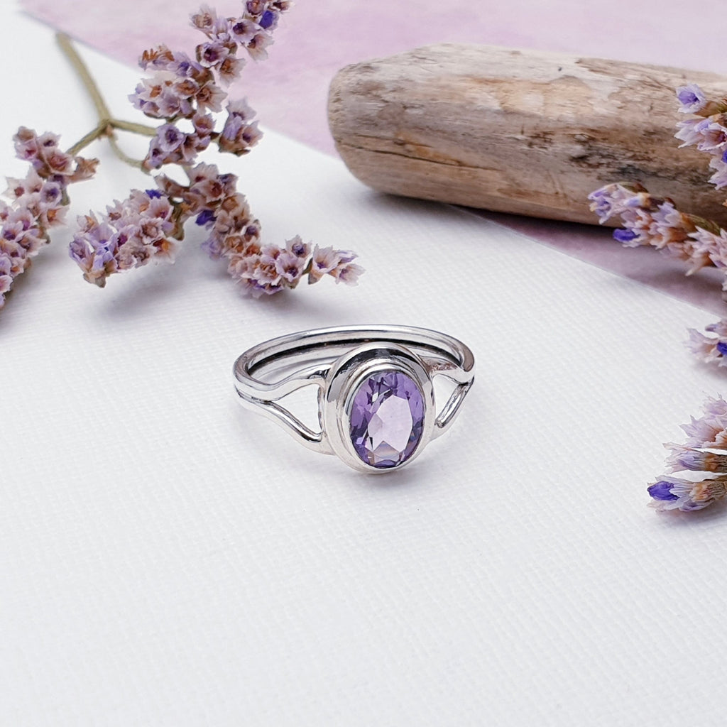 Our Amethyst Sterling Silver Aleatha Ring is perfect for everyday wear or special occasions.  A beautiful design, this ring features an oval, table top cut Amethyst stone in a simple, raised setting. A dainty design, this ring is comfortable to wear and is bound to become an everyday favourite. Perfect as a gift for a loved one or a treat for yourself.