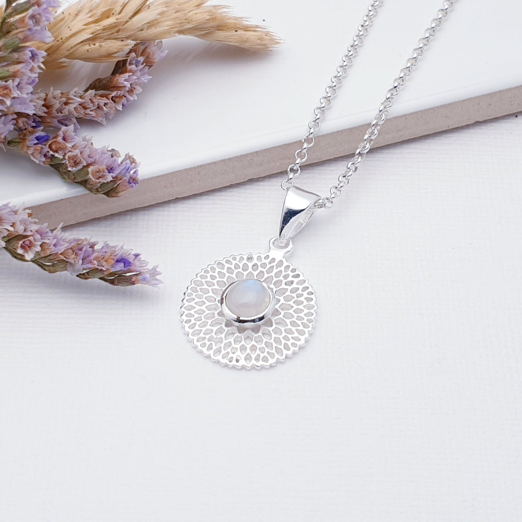 Our Moonstone Sterling Silver Chrysanthemum Pendant (chain not included) is so cute and would be perfect for everyday wear.  This stunning pendant features small, cabochon Moonstone in the center of a beautifully detailed flower. 