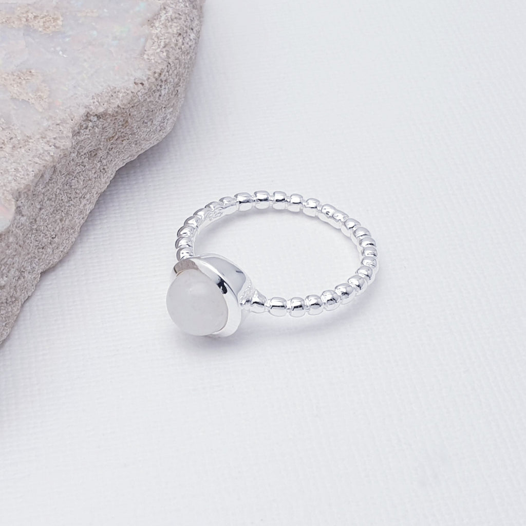 Our Moonstone Bubble Band Ring is perfect for everyday wear or special occasions.  A beautiful design, this ring features a stunning, round, cabochon, Moonstone stone in a simple lowered setting. The band is shaped in a bubble-like ball design, to add extra detailing.