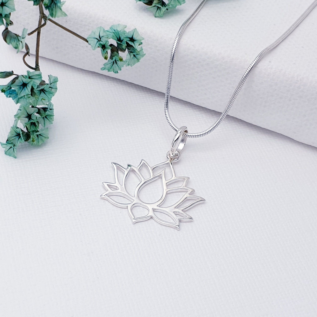 Our Sterling Silver Lotus Flower Pendant (chain not included) is perfect for everyday wear or special occasions.  Embrace the beauty of nature with our Sterling Silver Lotus Flower Pendant.  Its timeless design will make for the perfect finishing touch to any outfit.