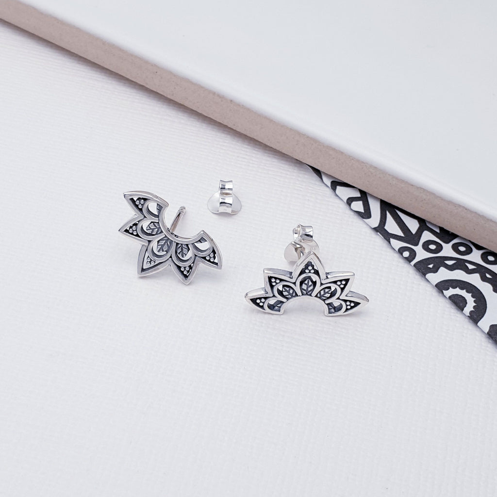 Our Sterling Silver Half Mandala Studs are perfect for everyday wear.  These studs feature an intricate design which is enhanced by an oxidised finish and inspired by the popular Mandala. The Mandala is a symbol used in Buddhism and Hinduism which represents the Universe.
