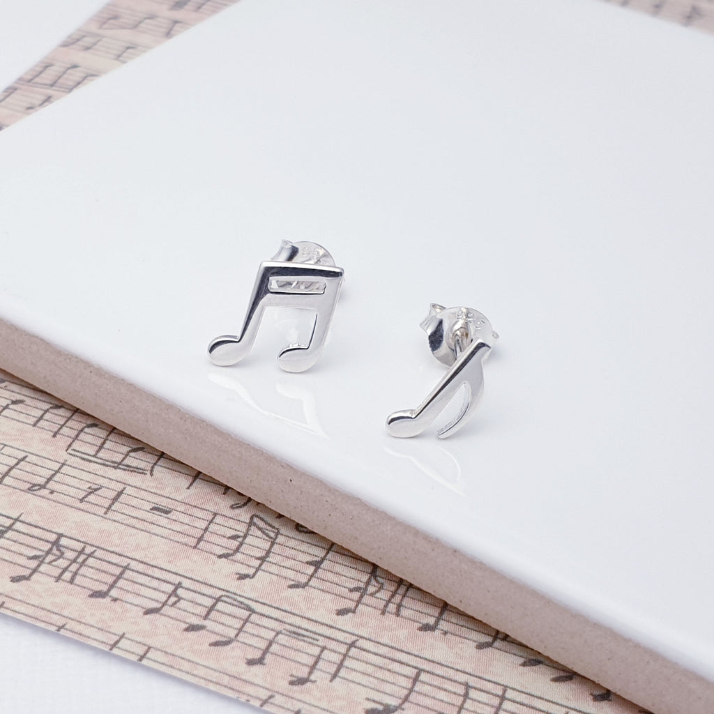 Our Sterling Silver Musical Notes Studs are perfect for everyday wear.  These Sterling Silver Musical Notes Studs feature one Quaver and one Beam Note Symbol. They are so cute and would make the perfect gift for any music lovers. A special touch of musical magic that you won't find anywhere else. Show your unique style and musical appreciation with these one-of-a-kind earrings.
