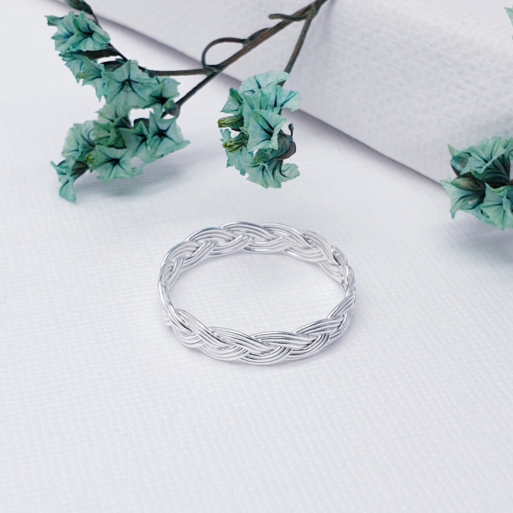 Our Sterling Silver Woven Ring is perfect for everyday wear or special occasions.  A simple and dainty design, this ring features a rope style effect creating a woven pattern. The perfect accessory to any outfit, this ring will complement any style and is bound to be well received.