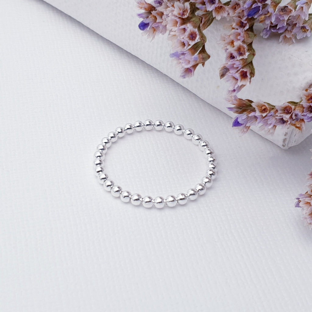 This Sterling Silver Beaded Ring is a perfect pick for everyday wear. With its simple design, it's ideal for stacking with other jewellery pieces. Crafted from Sterling Silver, it's a timeless piece that'll never go out of style.