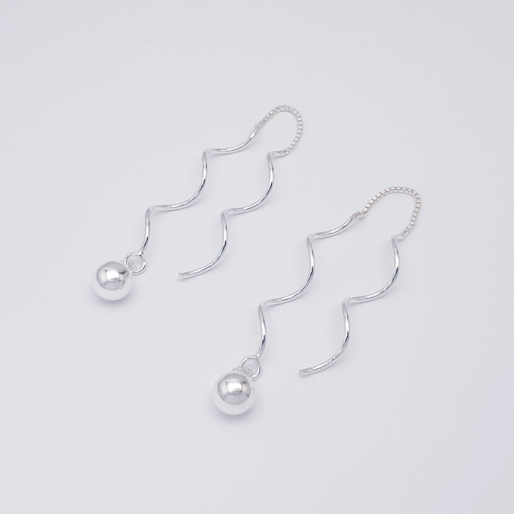 a pair of Sterling Silver Twisted Ball Pull Through Earrings