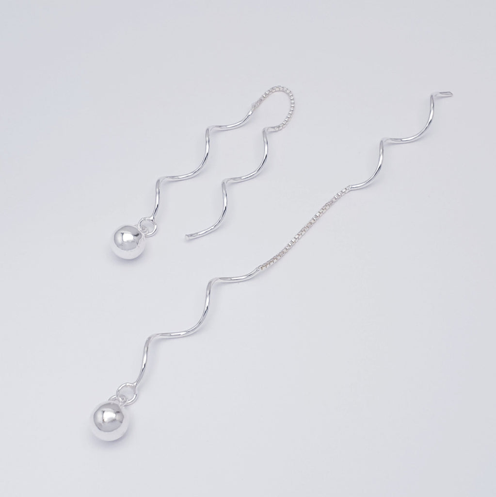 a pair of Sterling Silver Twisted Ball Pull Through Earrings