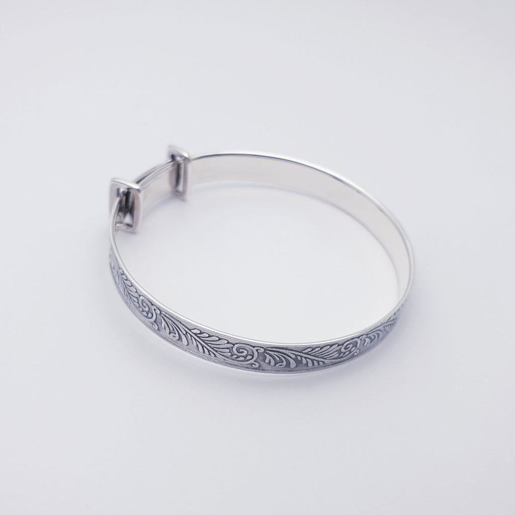 sterling silver Baby christening bangle with botanical fern design