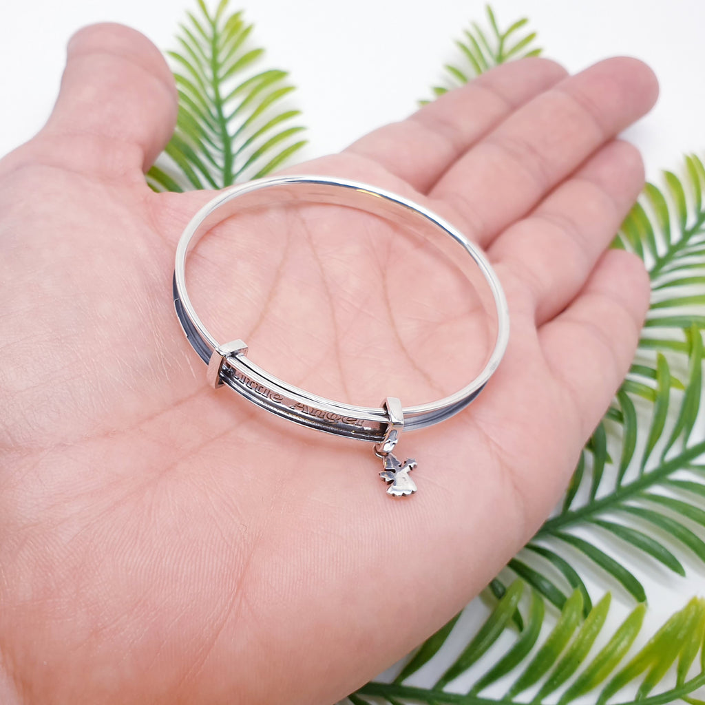 Sterling silver bangle with engraved little angel and delicate angel charm