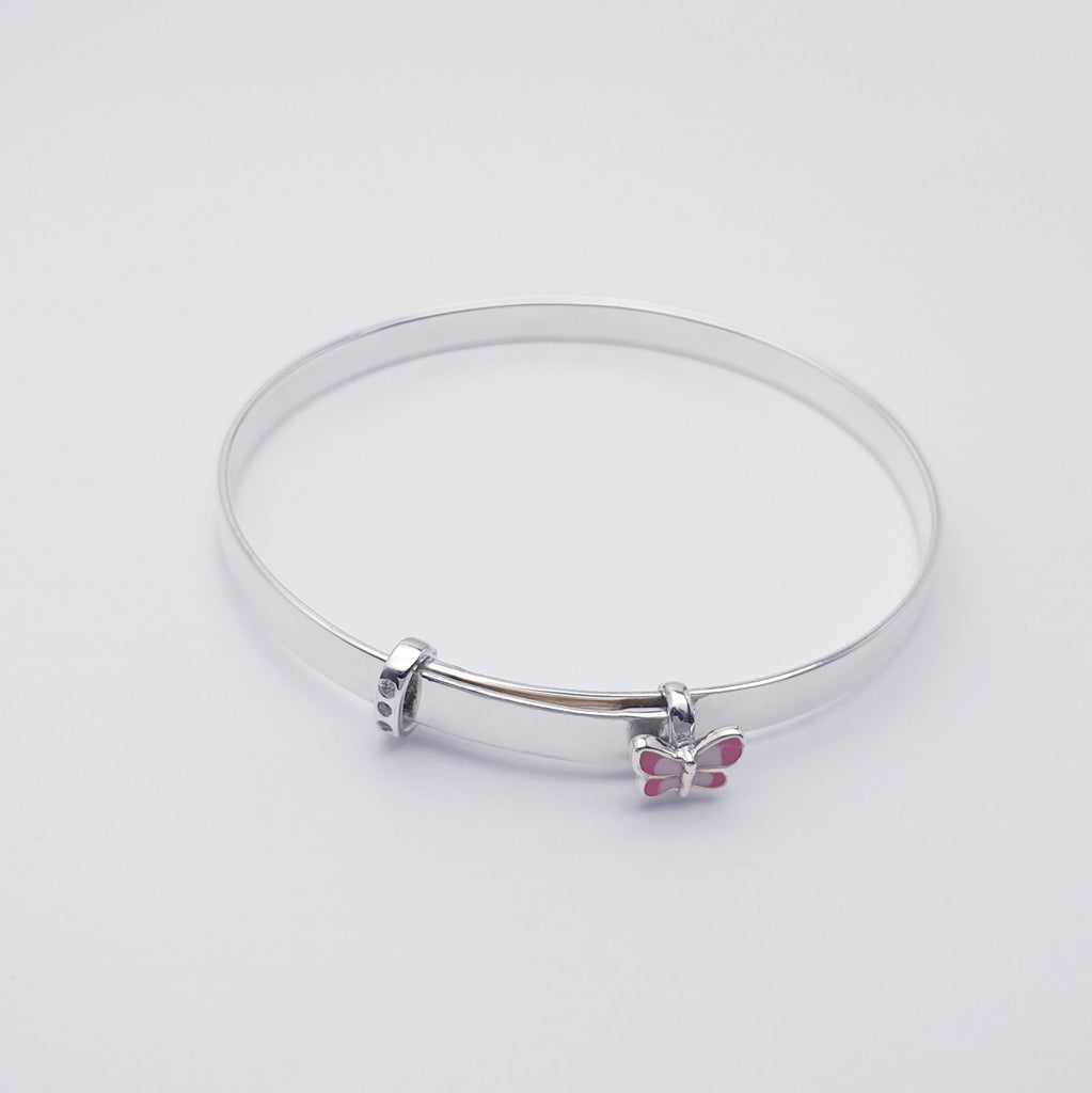 A beautiful, dainty bangle made in Sterling Silver. An extra special design with a tiny pink butterfly charm and 3 diamante diamonds. 