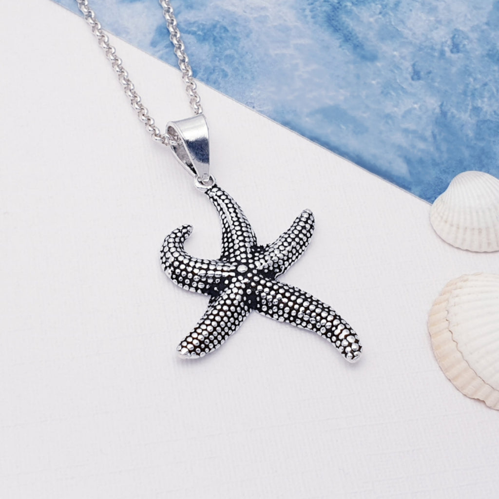 Oxidised sterling silver handmade starfish pendant.