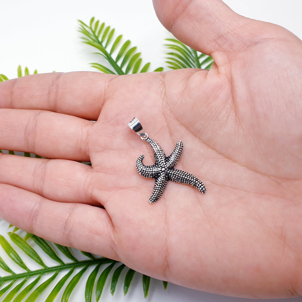 Oxidised sterling silver handmade starfish pendant.