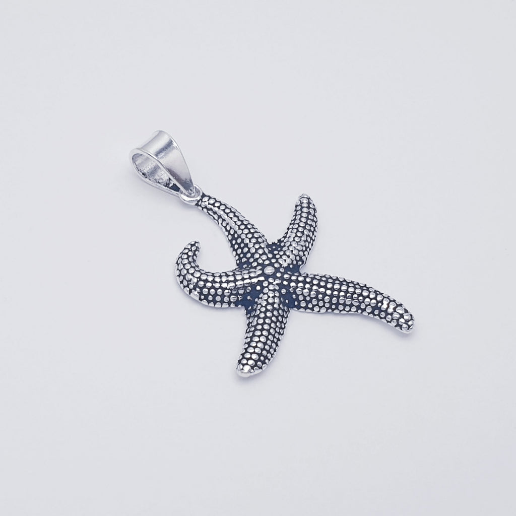 Oxidised sterling silver handmade starfish pendant.