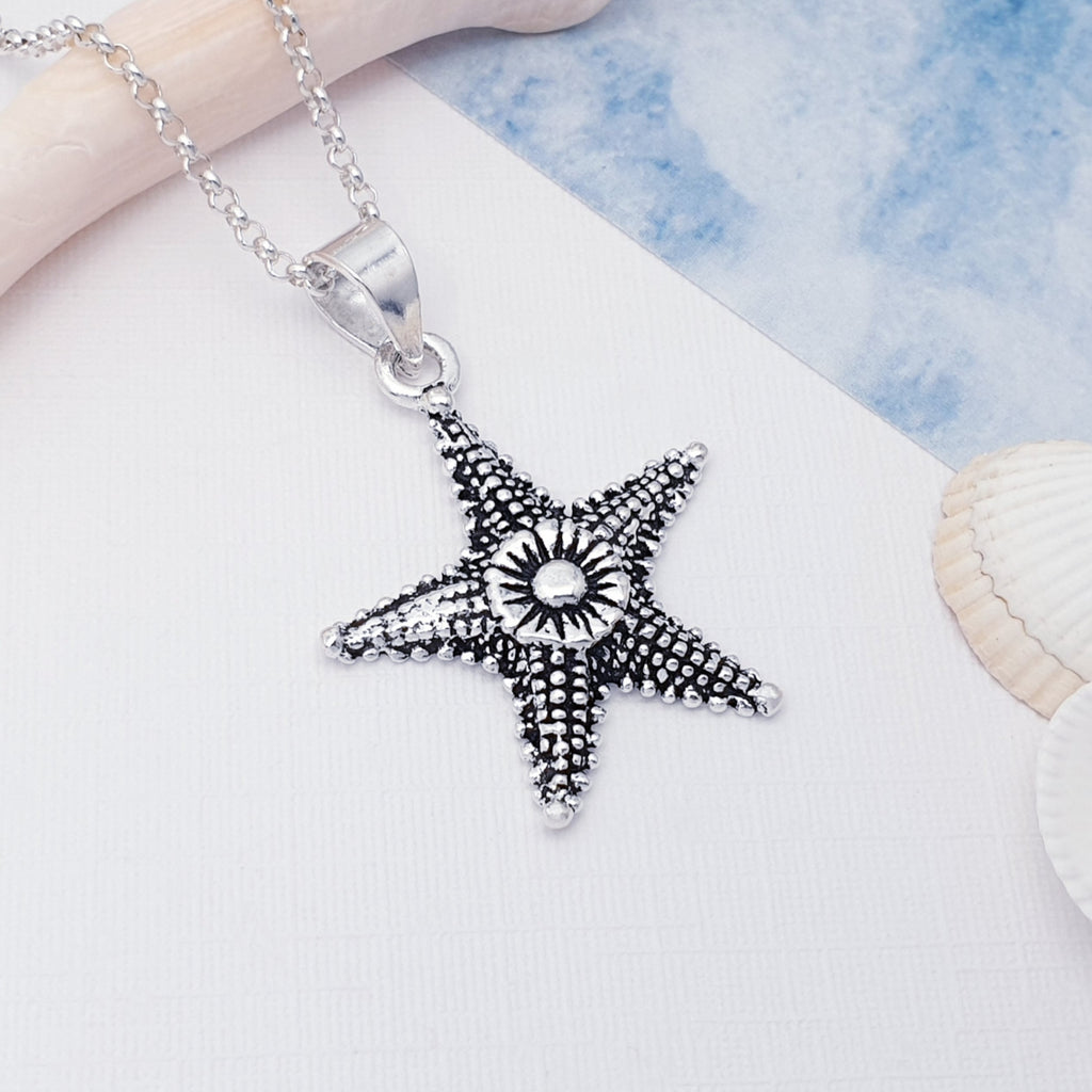 handmade oxidised sterling silver starfish pendant.