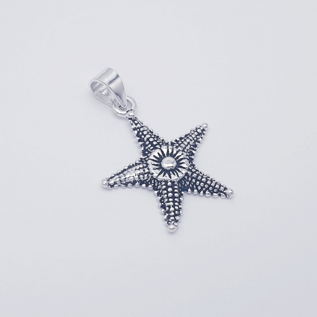 handmade oxidised sterling silver starfish pendant.