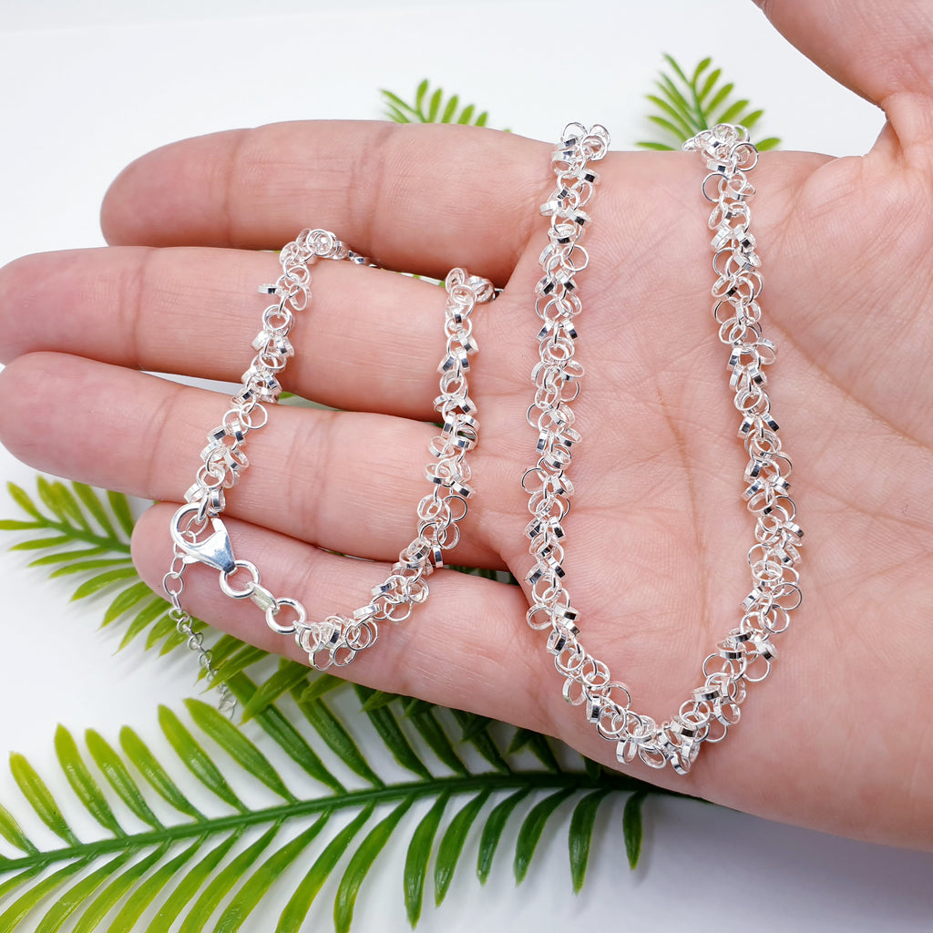 handmade, elegant sterling silver intertwined multi link chain necklace.