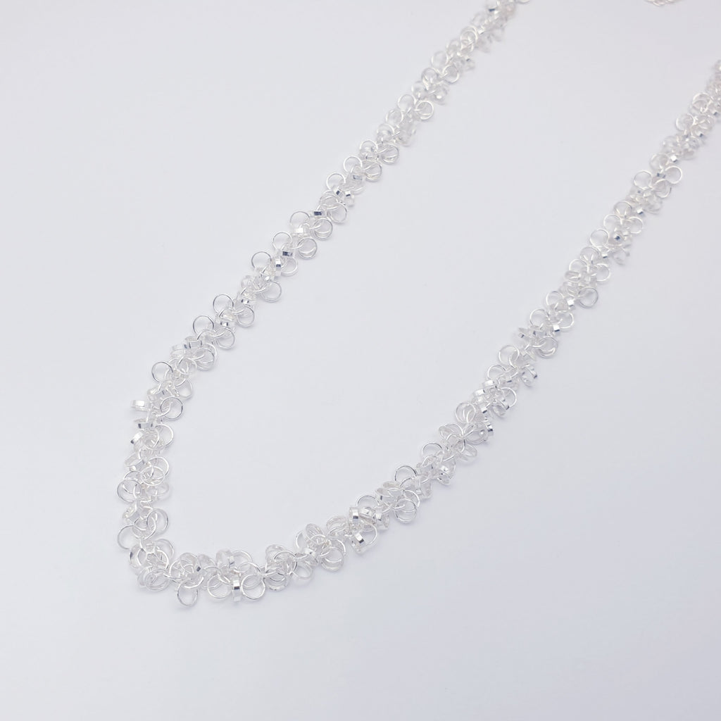 handmade, elegant sterling silver intertwined multi link chain necklace.