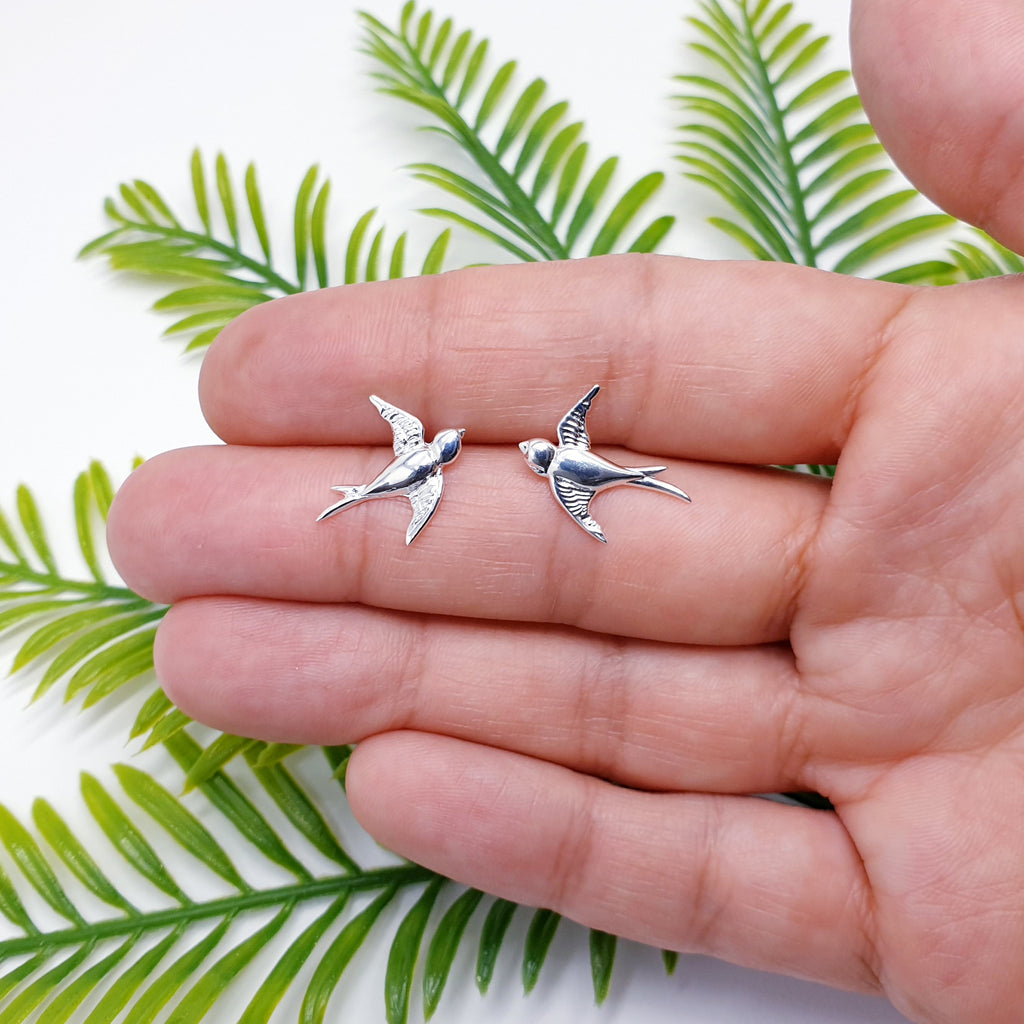 beautiful swift bird stud earrings handmade in polished sterling silver