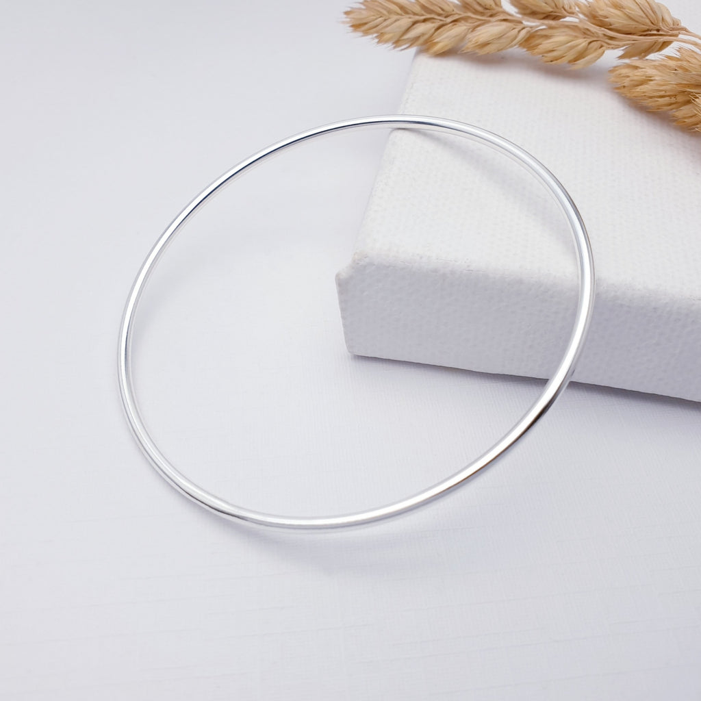 Chic, handmade sterling silver fine tube bangle