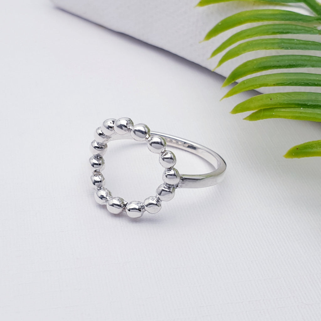 handmade sterling silver beaded circle ring.