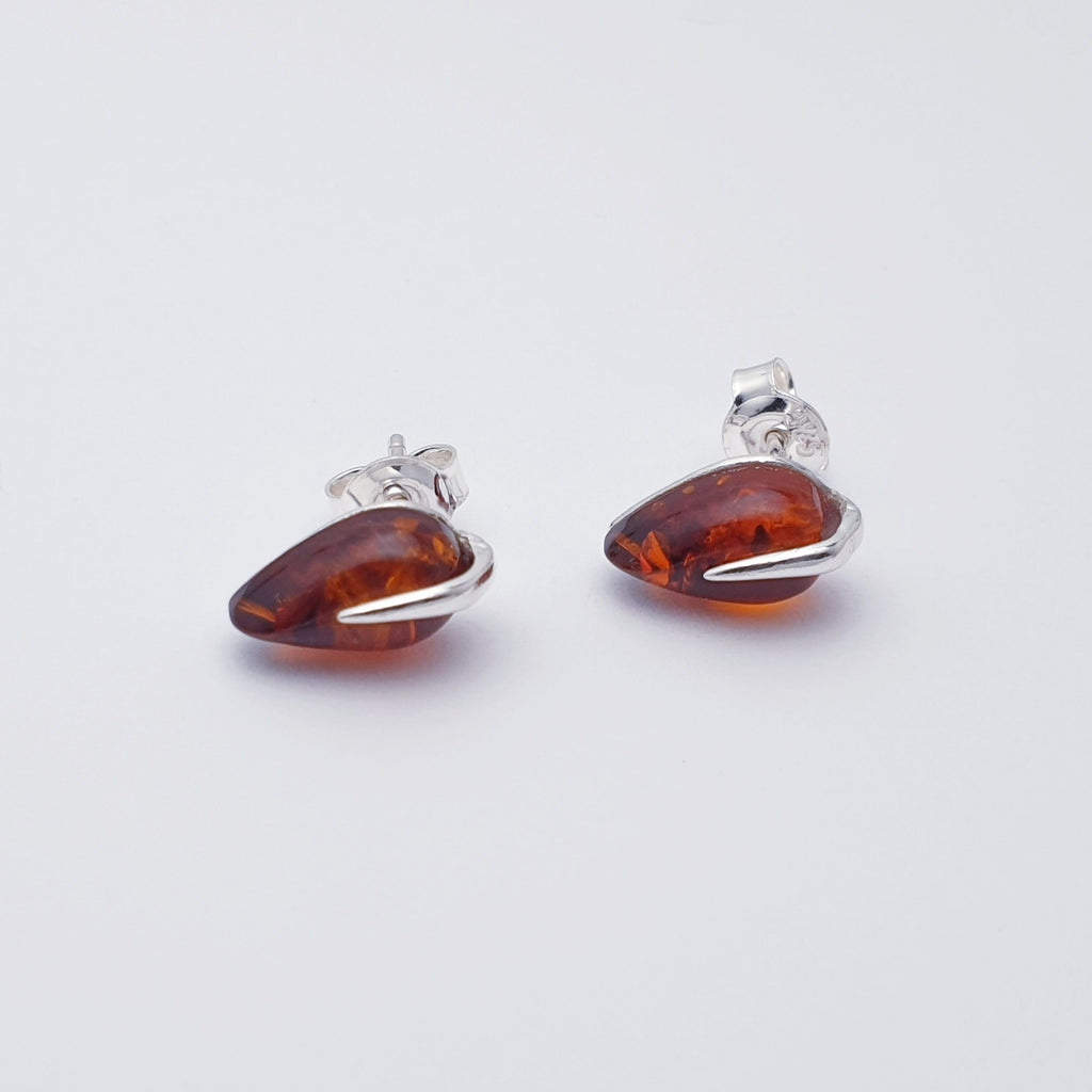 Dainty toffee amber leaf design stud earrings front side view
