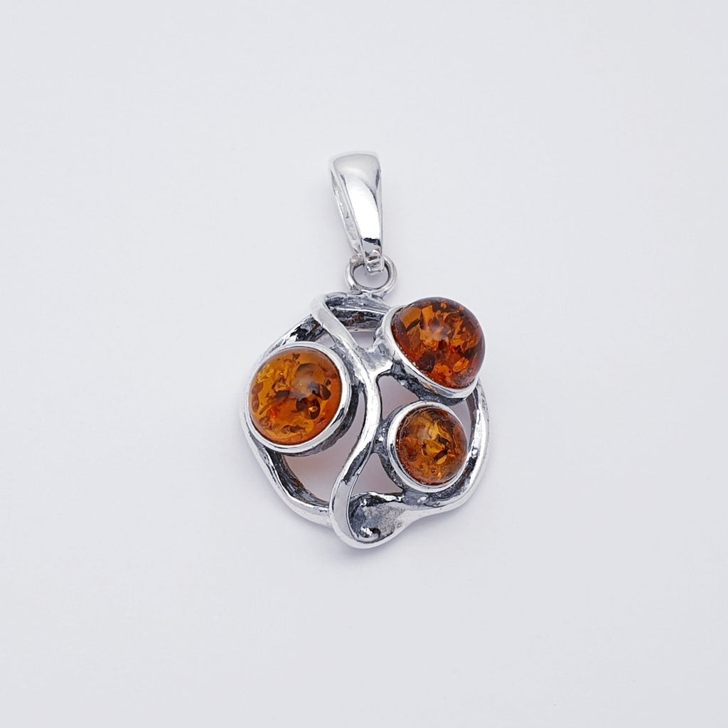 a toffee Amber Sterling Silver pendant
