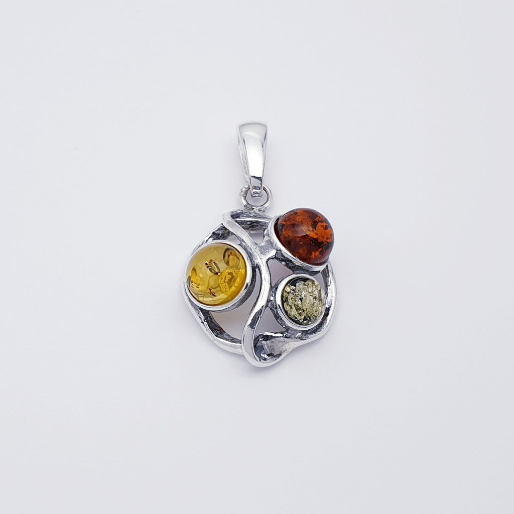 a Mixed Amber Sterling Silver pendant