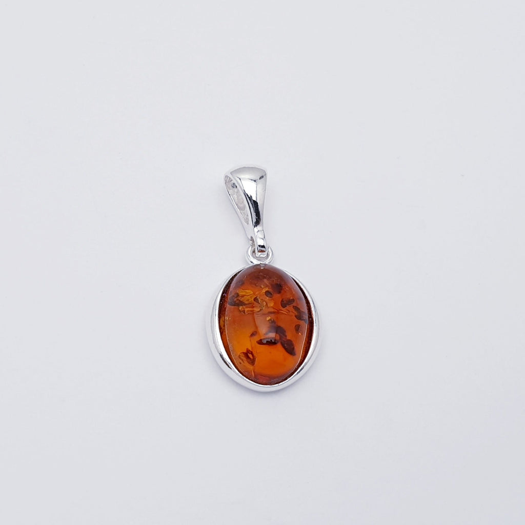 dainty oval vintage style amber pendant