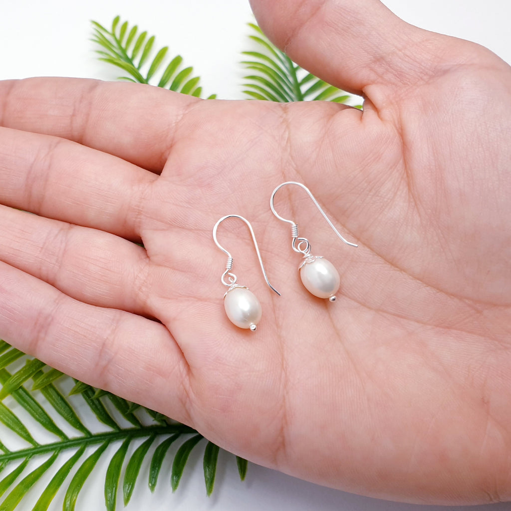 Handmade pearl and sterling silver earrings.