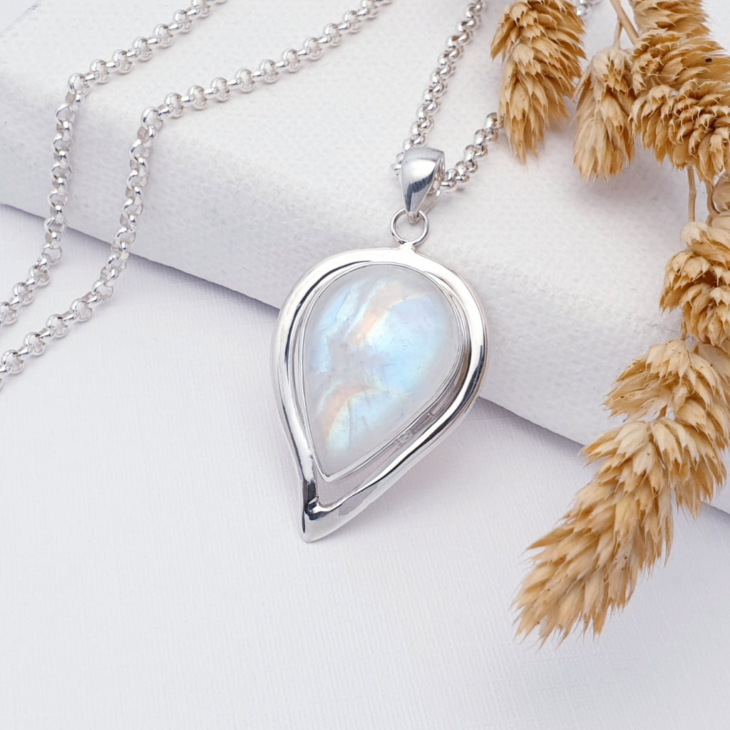 Natural gemstone Moonstone teardrop pendant set in sterling silver.