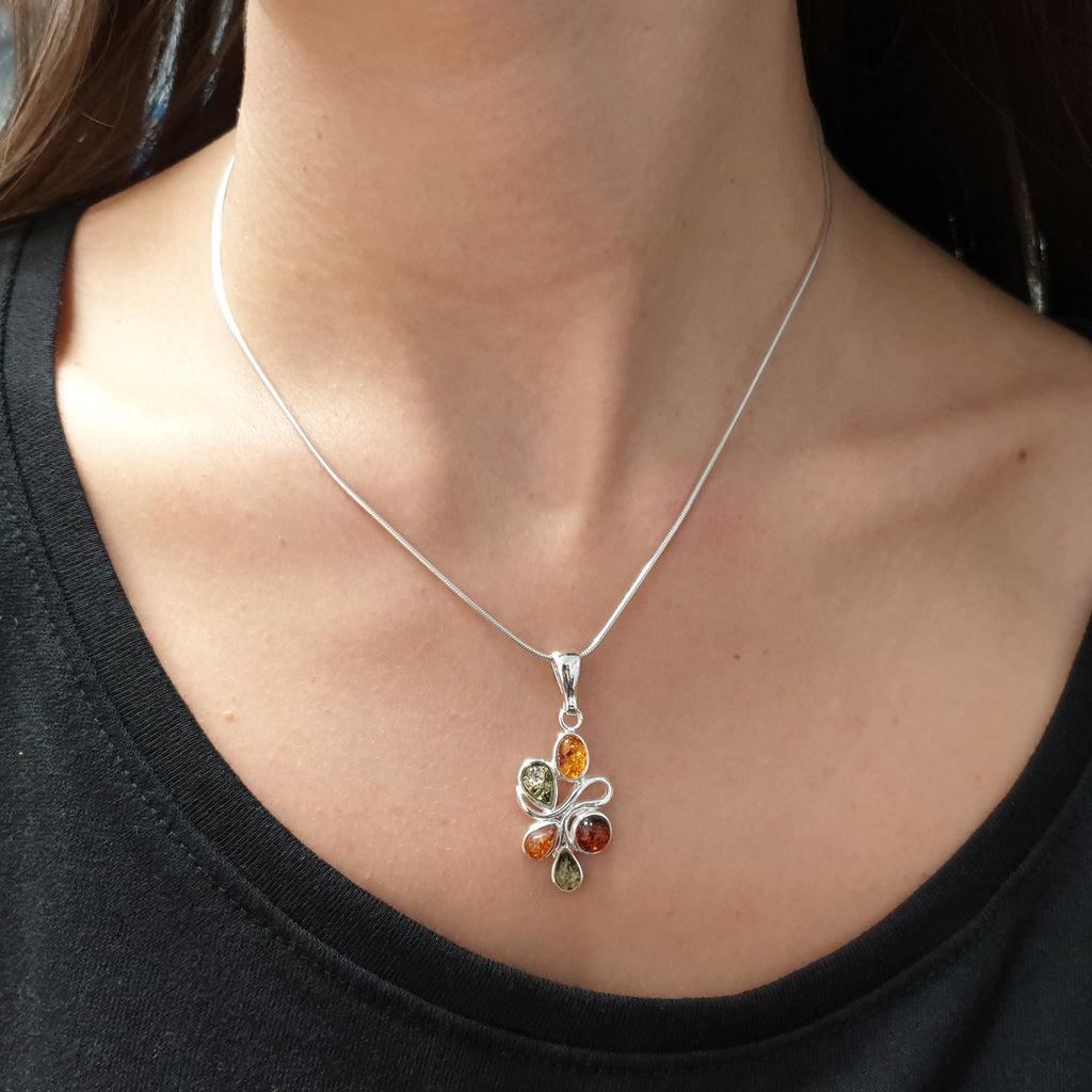 a silver mixed amber necklace