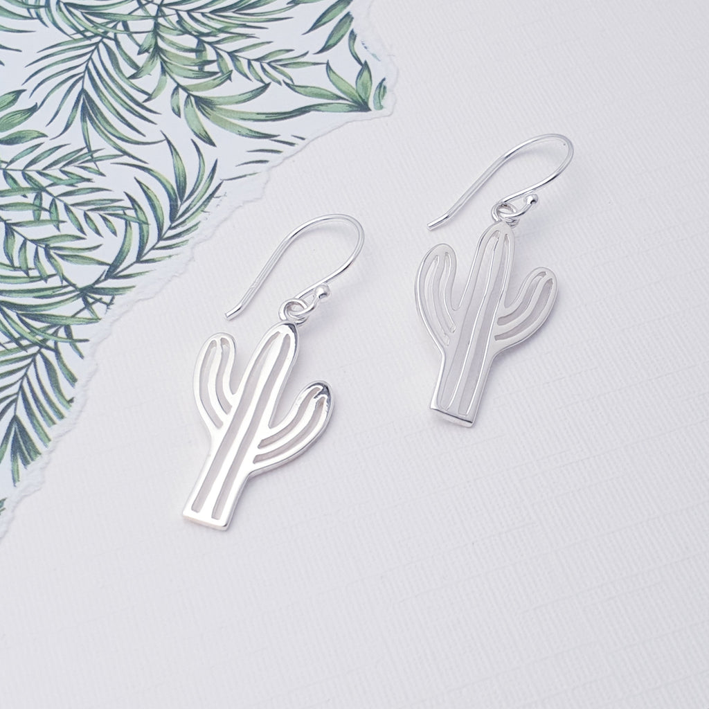 With a gorgeous cactus cut out design, these earrings are perfect for your next holiday or to add a touch of tropical vibe to any outfit. 