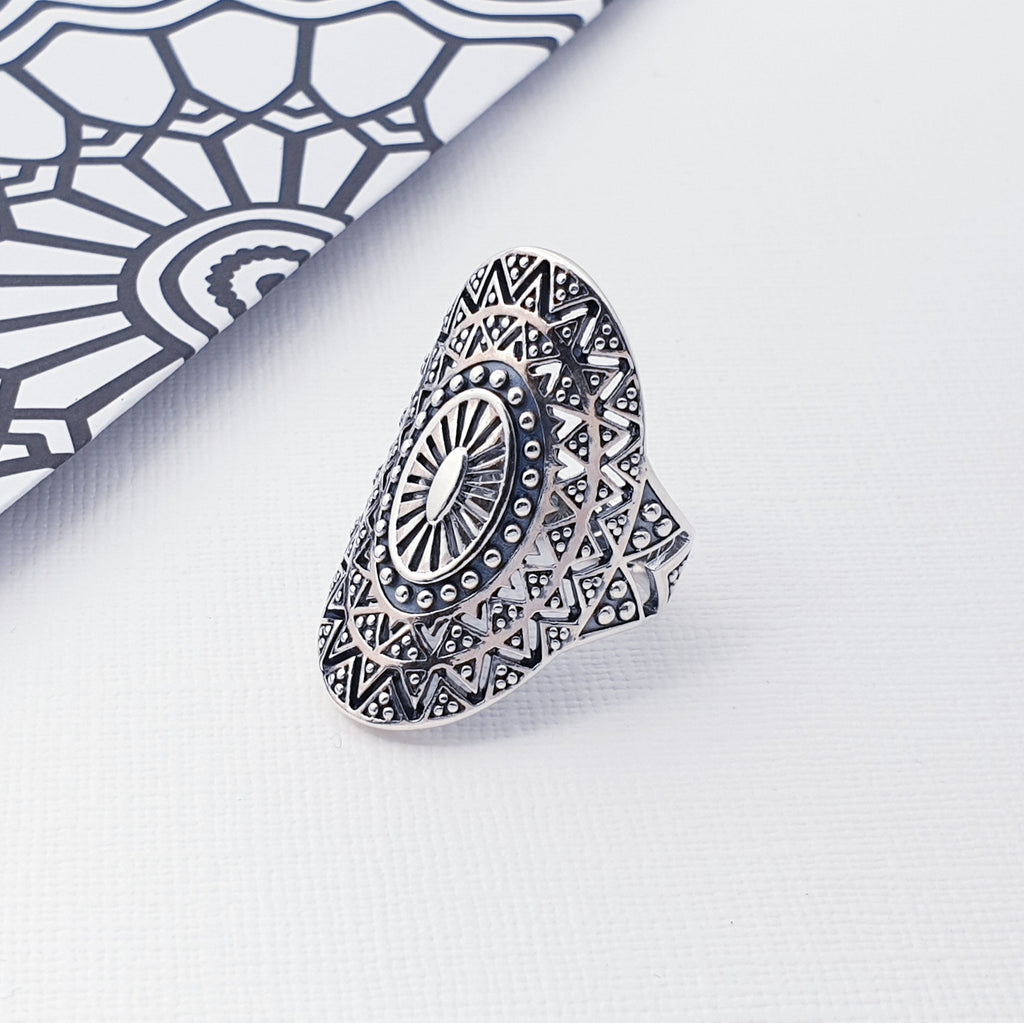 A beautiful design, this ring features an intricate cut out design enhanced by an oxidised finish and inspired by the popular Mandala. The Mandala is a symbol used in Buddhism and Hinduism which represents the Universe. Recently this has become a very popular design used in jewellery, clothing and accessories.