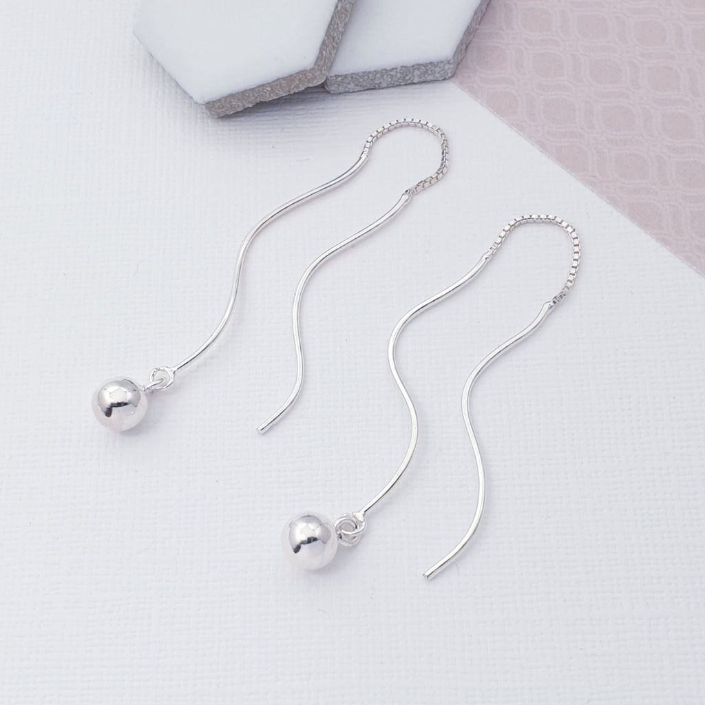 With a pull through silver twist that give these earrings a unique look and a touch of elegance these dynamically different earrings are sure to catch the eye.