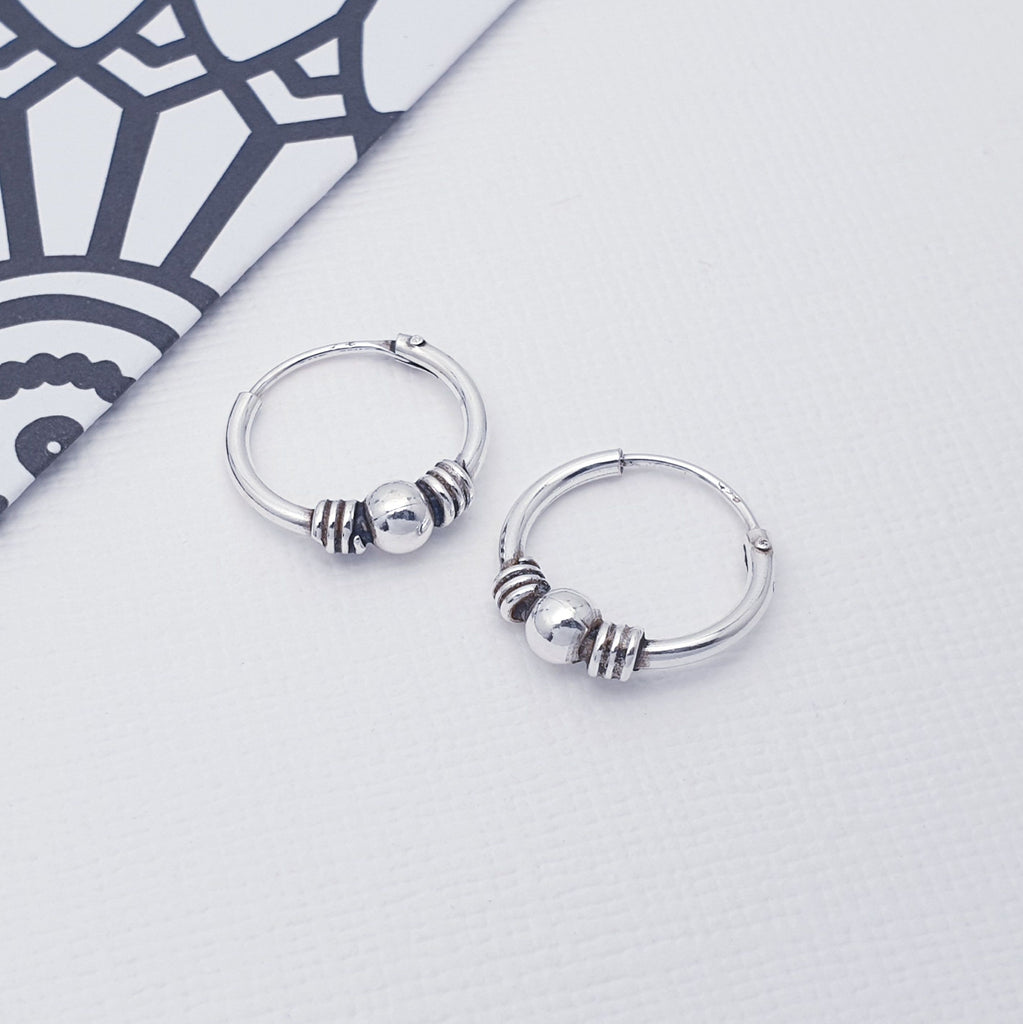 These Sterling Silver hoops have beautiful, Bali style intricate detailing. This enhances the Bohemian style and are perfect for your next summer festival or holiday.