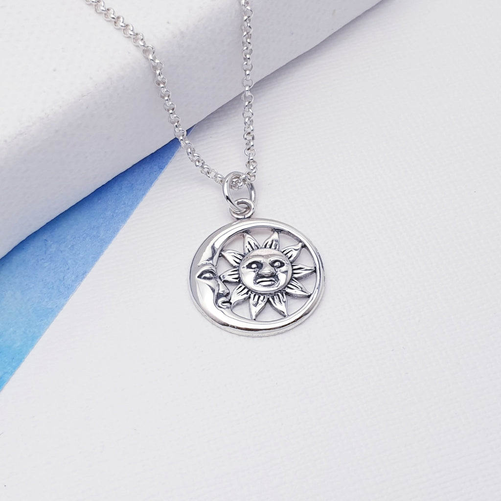 Small and dainty, this pendant features a beautifully detailed Sun and Moon face design. It looks great worn on its own on a short chain or layered with other necklaces creating your own unique look. 