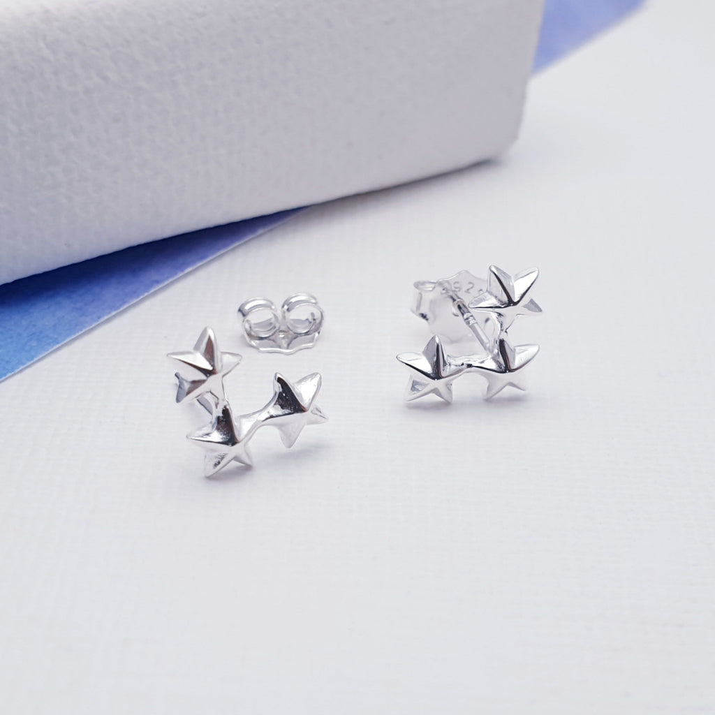 These studs feature a trio of Stars in a beautiful cluster form! Perfect for everyday wear, these little studs are understated, light on the ear, easy to wear and will add a touch of fun to any outfit. We love celestial jewellery here at Silver Scene and these earrings are one of our favourite designs.