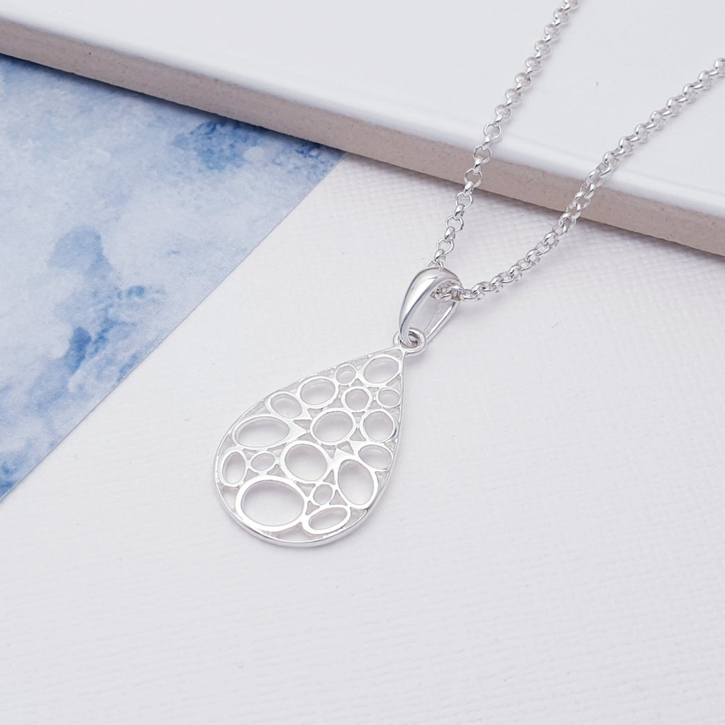 With a fun and contemporary design inspired by bubbles in a teardrop shape. This gorgeous pendant will finish off any outfit. 