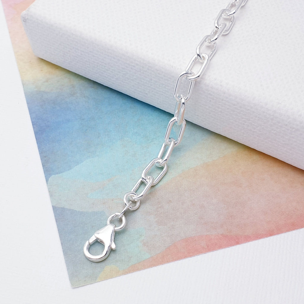 Our beautiful Sterling Silver Paperclip Link Bracelet is perfect for everyday wear or special occasions.  This design features small oval links that are connected in a paperclip pattern, creating a beautiful and classic design. 