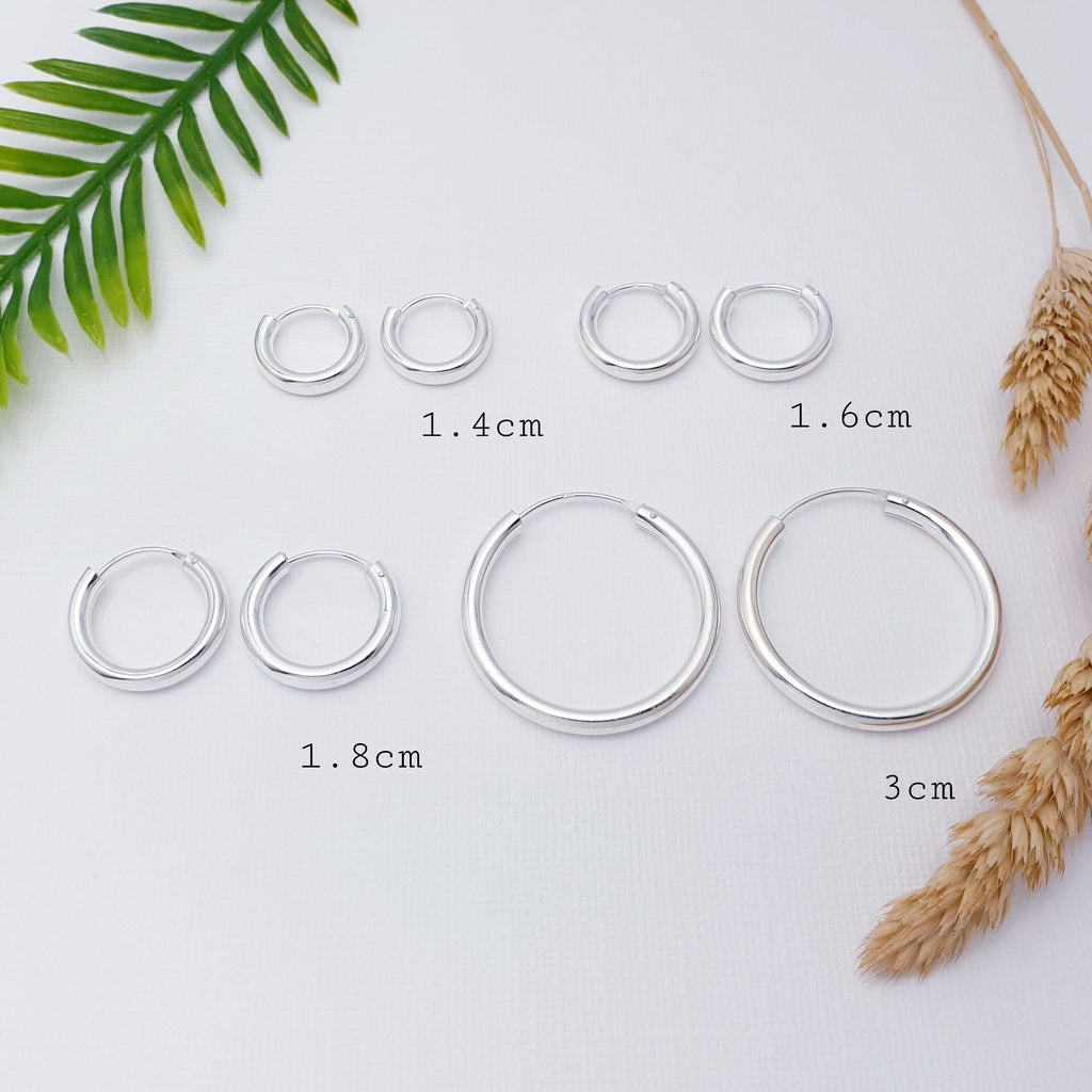 Our Sterling Silver Sleeper Thick Hoops are ideal for everyday wear and can transition effortlessly from work to play.  Plain silver hoops have always been popular in our shops and they are a must have in any jewellery box collection.  They can be a little tricky to get in (especially smaller sizes), but once in, you can forget about them as they are very unlikely to come out and get lost. Comfortable to wear and light on the ear, they are the perfect everyday wearers. 