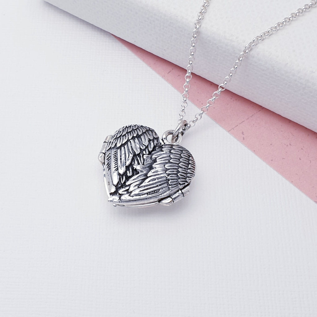 Our beautiful Sterling Silver Love Wings Locket (chain not included) is perfect for everyday wear or special occasions, a beautiful finishing touch to any outfit.   Keep your love close to your heart with this charming Sterling Silver Love Wings Locket! Adorned with romantic, detailed wings, it's a sentimental keepsake that'll have your heart soaring. (Plus it'll look fly no matter how you style it!)