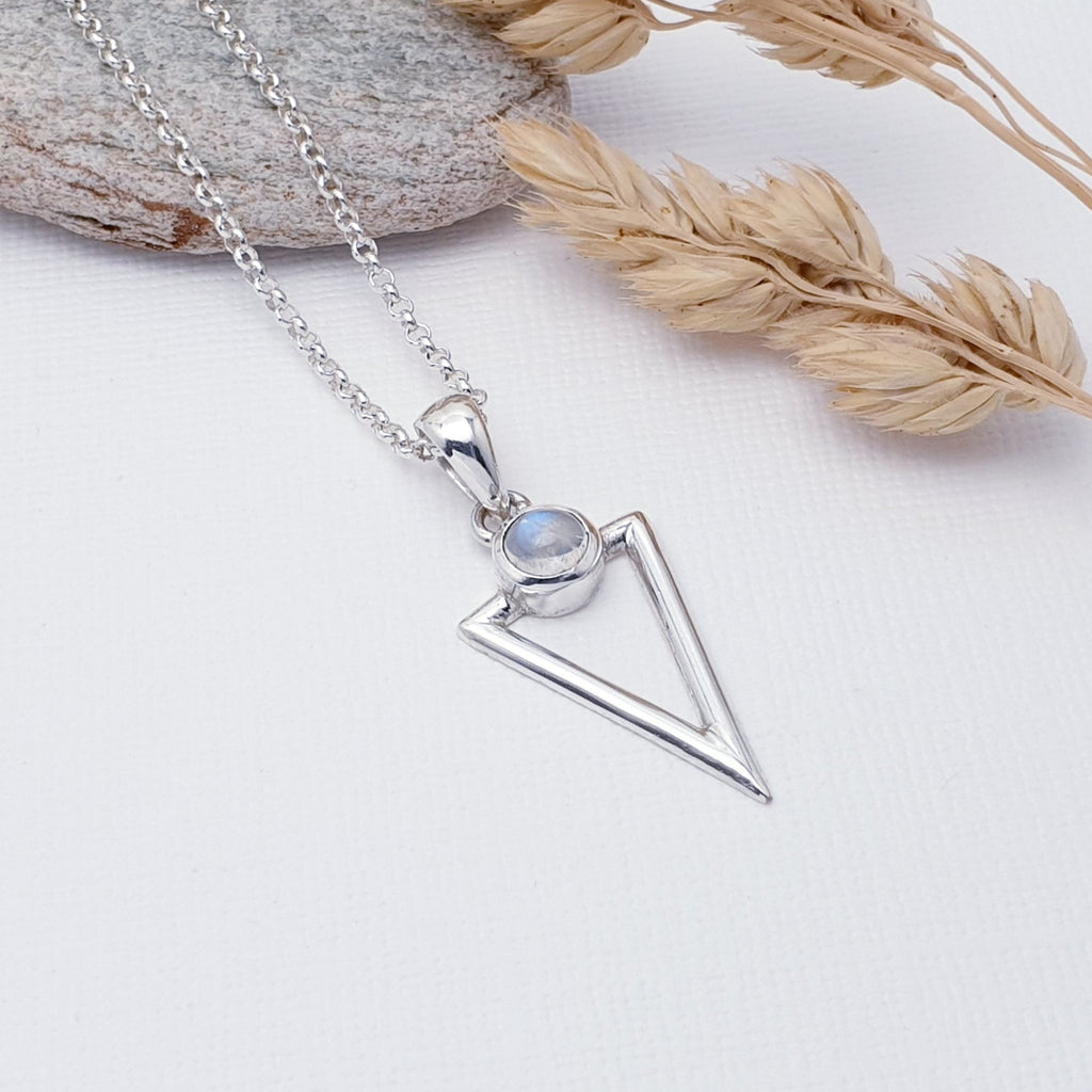 Our Moonstone Acute Triangle Pendant (chain not included) is perfect for everyday wear or special occasions.  This pendant features a beautiful Moonstone stone set above a cut out, acute triangle design, hand worked in Sterling Silver. A fabulous geometric pendant, perfect worn on its own or layered with other necklaces creating your own unique look.