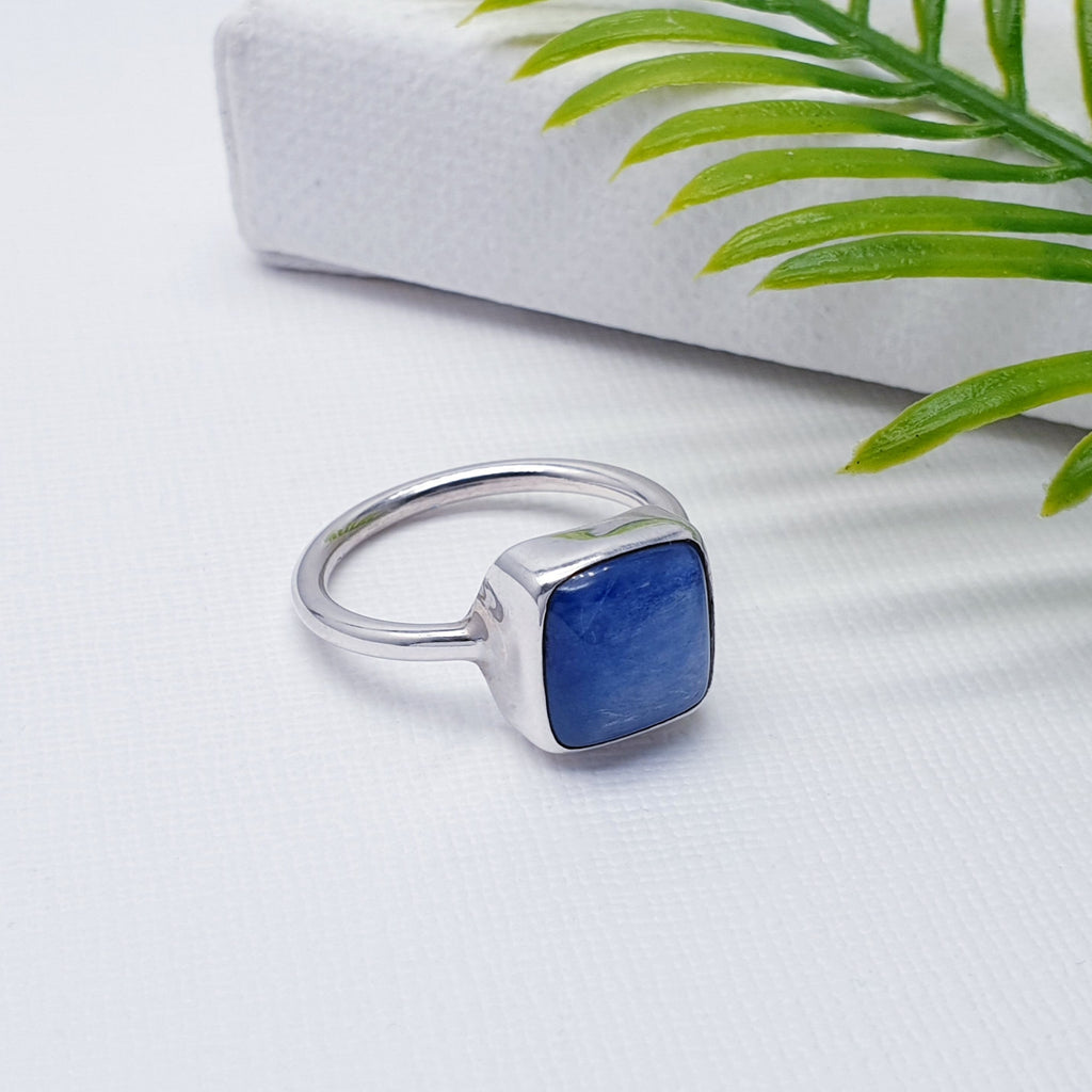 Our Kyanite Sterling Silver Square Ring is perfect for everyday wear or special occasions.  A beautiful simple design, this ring features a square cabochon, Kyanite stone in a simple setting on a sturdy band. This understated design will become your everyday favourite.